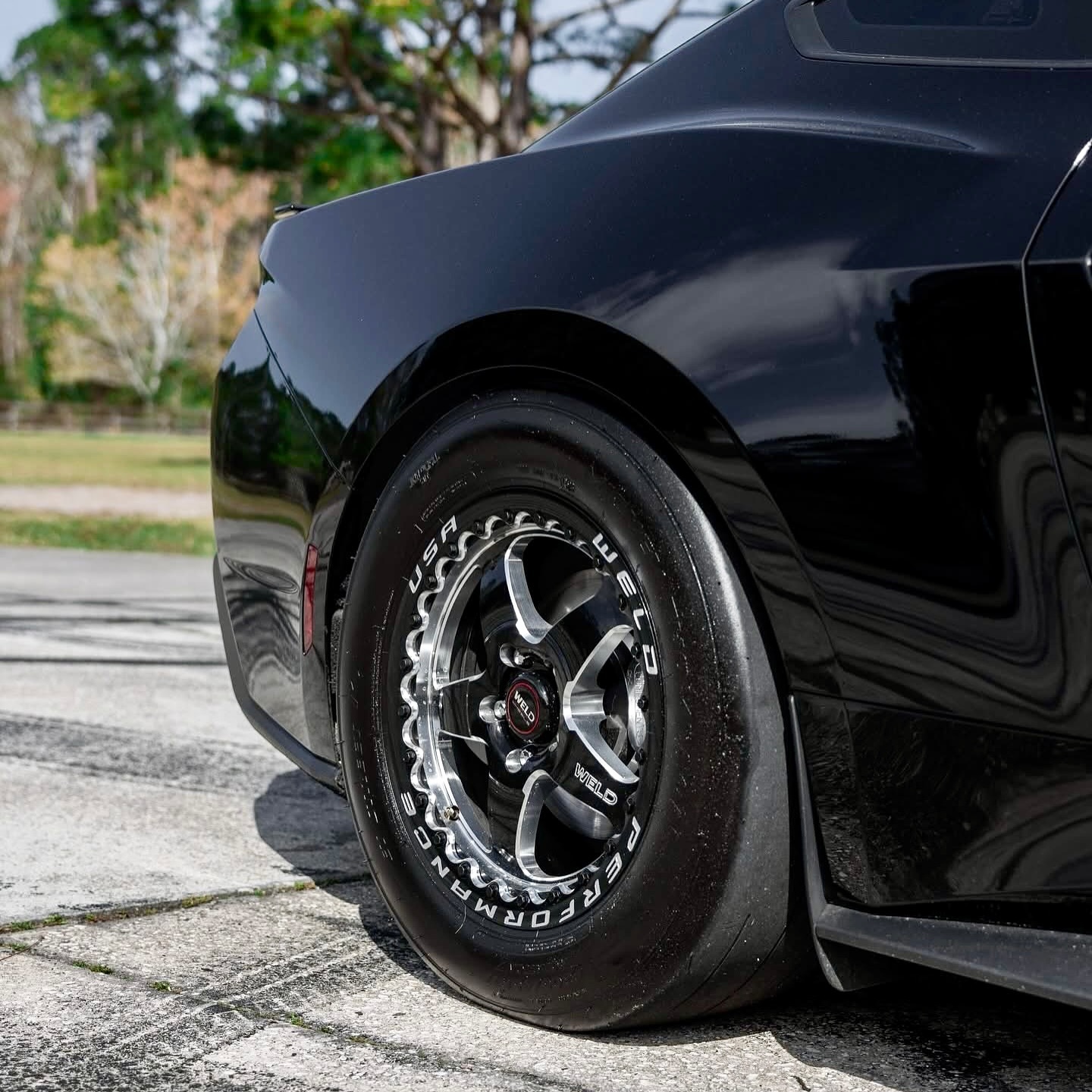 black car showcasing tires